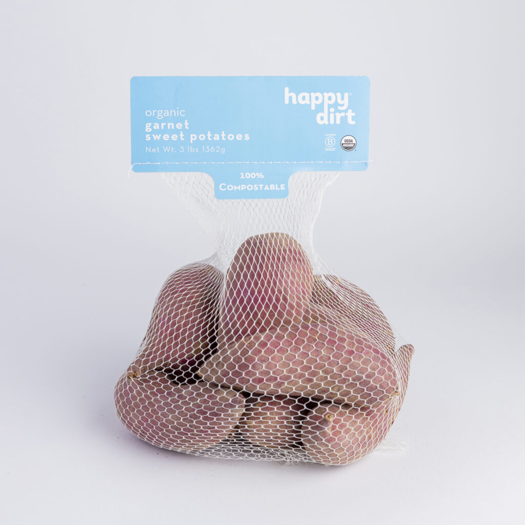 organic garnet bagged sweet potatoes on a white backdrop