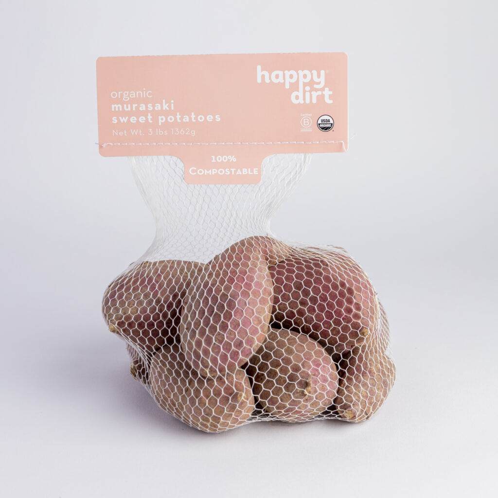 bagged murasaki organic sweet potatoes on a white backdrop