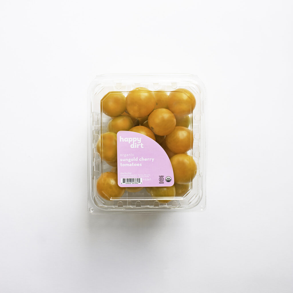 clamshell pint filled with organic sungold cherry tomatoes